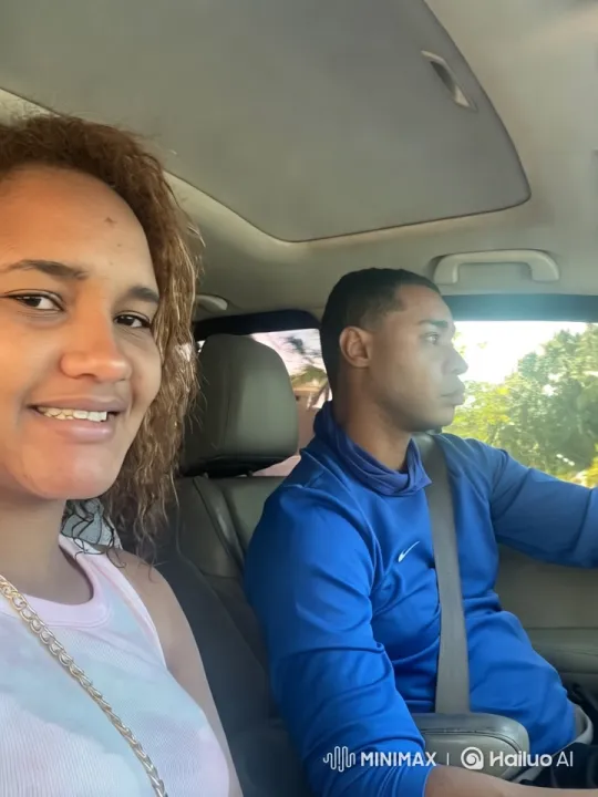 Couple Shares Intimate Moment in Modern, Sunlit Car – AI Generated Video | Hailuo AI