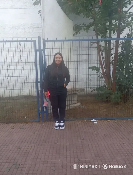 Dancer Moves Gracefully in Front of Blue Fence – AI Generated Video | Hailuo AI