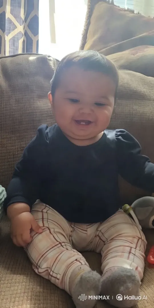 Baby's Playful Moment in Cozy Living Room – AI Generated Video | Hailuo AI