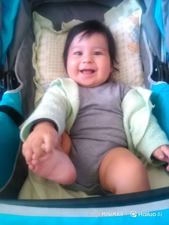 Baby's Energetic Dance in Colorful Stroller – AI Generated Video | Hailuo AI