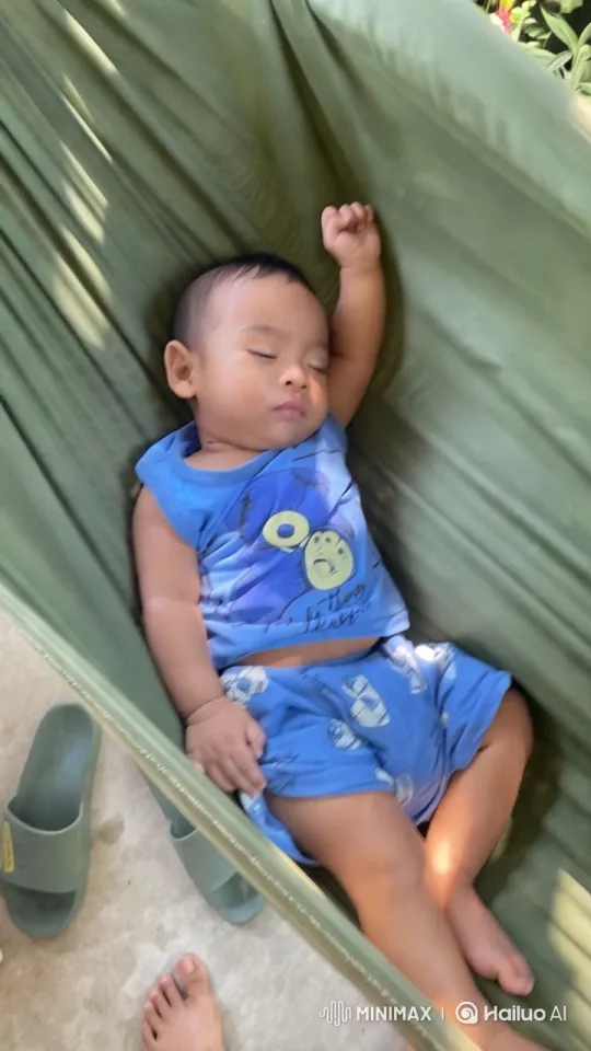 Baby Dancing in Hammock with Playful Punches – AI Generated Video | Hailuo AI