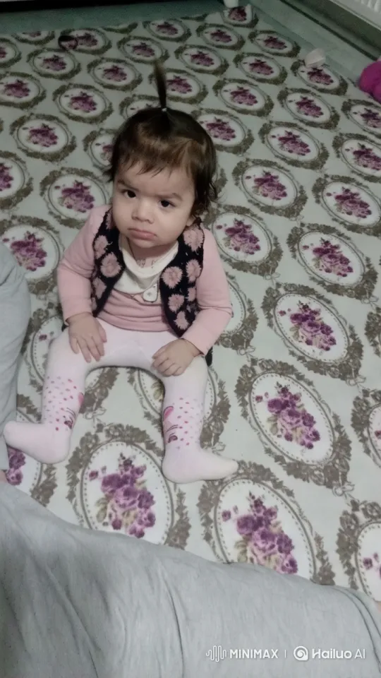 Toddler's Playful Dance on Floral Carpet – AI Generated Video | Hailuo AI