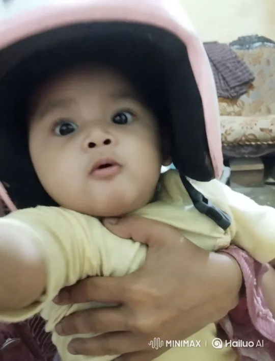 Child Practicing Kung Fu with Support in Cozy Indoor Setting – AI Generated Video | Hailuo AI