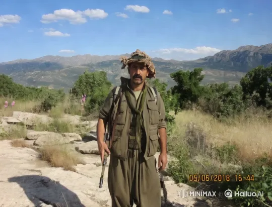 Military Man in Mountainous Landscape – AI Generated Video | Hailuo AI