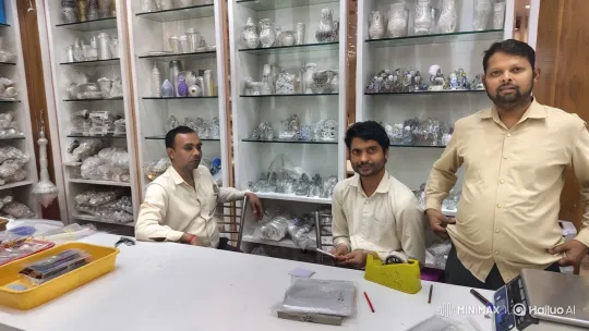 Three Men Share Affection in Sparkling Glass Shop – AI Generated Video | Hailuo AI