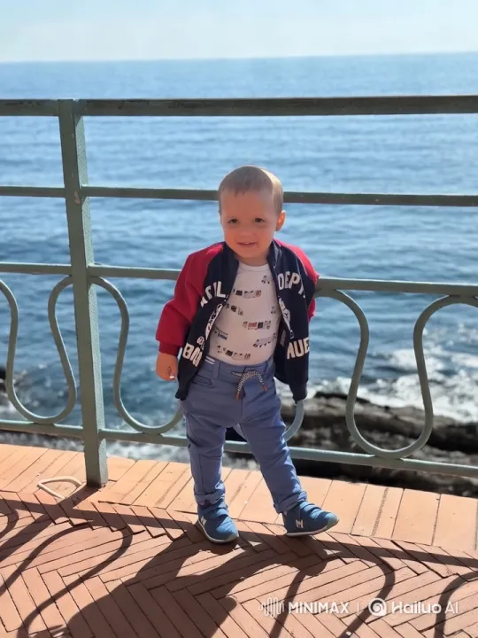 Aesthetic Portrait of a Child on a Terrace Overlooking the Ocean – AI Generated Video | Hailuo AI