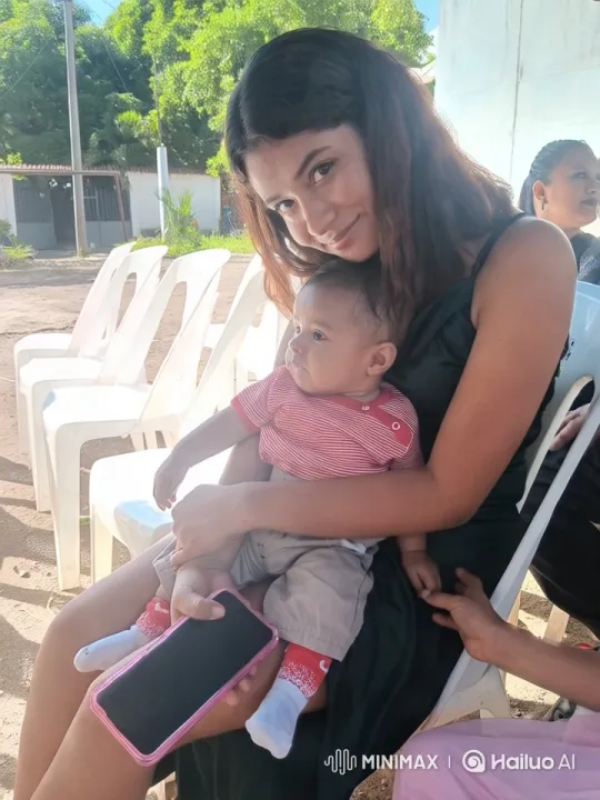 Woman and Baby in Serene Outdoor Setting – AI Generated Video | Hailuo AI
