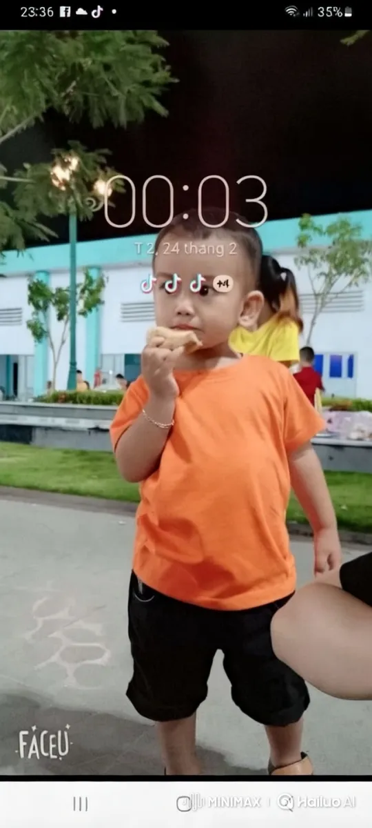 Child in Orange Shirt at Night Outdoor Setting – AI Generated Video | Hailuo AI