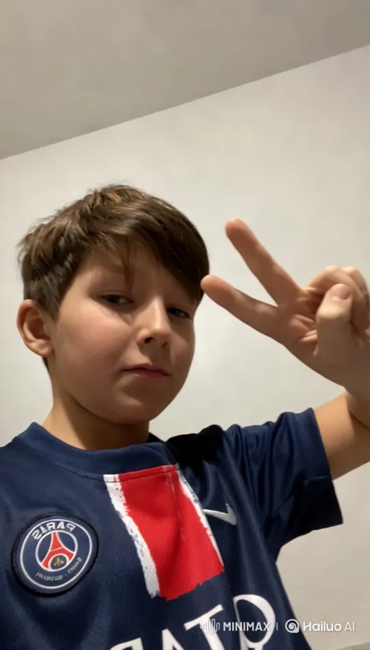 Paris Saint-Germain Fan Boy Makes Peace Sign – AI Generated Video | Hailuo AI