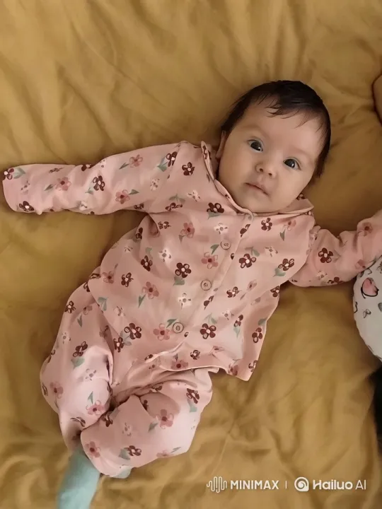 Baby's Joyful Dance in Cozy Yellow Bed – AI Generated Video | Hailuo AI