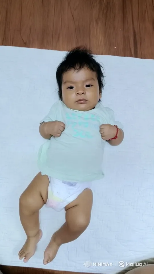 Baby's Gentle Movements on White Mat - Live2D Animation – AI Generated Video | Hailuo AI