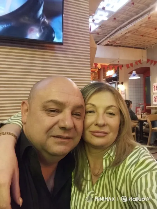 Couple's Intimate Moment in Cozy Restaurant – AI Generated Video | Hailuo AI