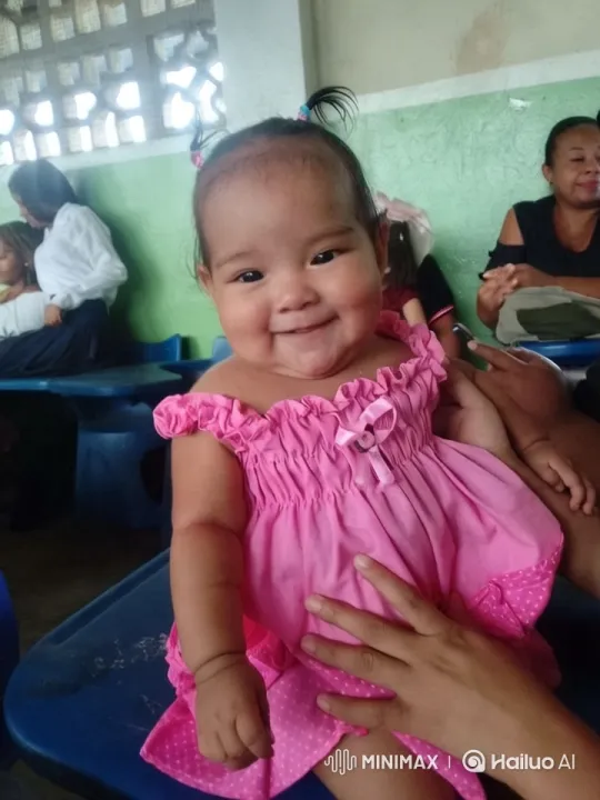 Baby Girl in Pink Dress Explores Classroom Setting – AI Generated Video | Hailuo AI