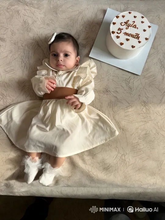 Aesthetic Celebratory Scene of a Baby and Cake – AI Generated Video | Hailuo AI