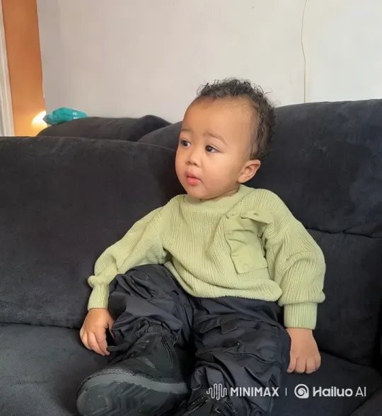 Child Dancing with Grace on a Couch – AI Generated Video | Hailuo AI
