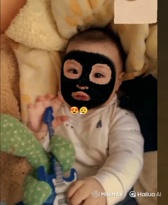 Baby with Toy Guitar on Cozy Blanket – AI Generated Video | Hailuo AI