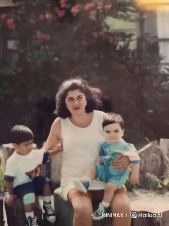 Family Embraces in Serene Garden Setting – AI Generated Video | Hailuo AI