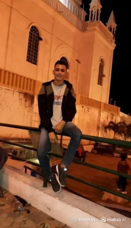 Dancer-Kung Fu Artist Performs in Front of Lit Building – AI Generated Video | Hailuo AI