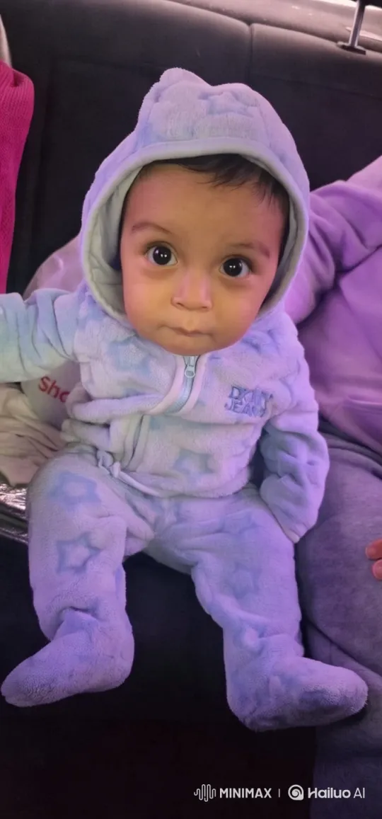 Baby Dancing in Cozy Onesie, Captivating Car Seat Scene – AI Generated Video | Hailuo AI