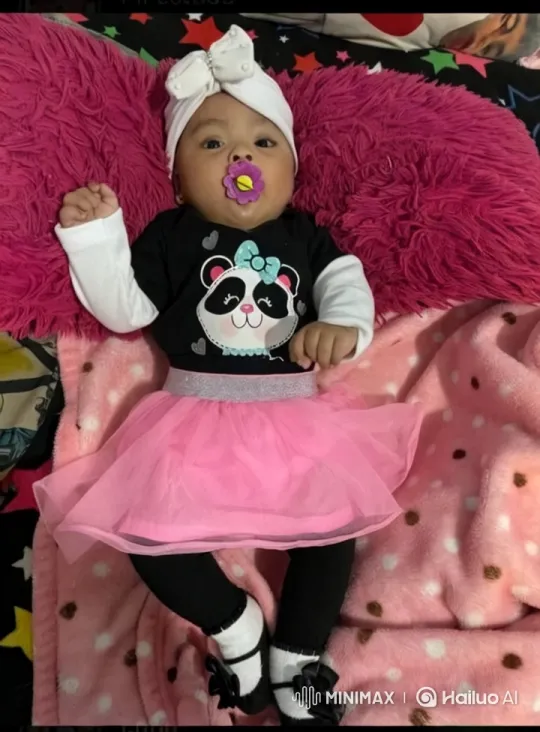 Baby Dances in Panda Outfit on Colorful Bed – AI Generated Video | Hailuo AI