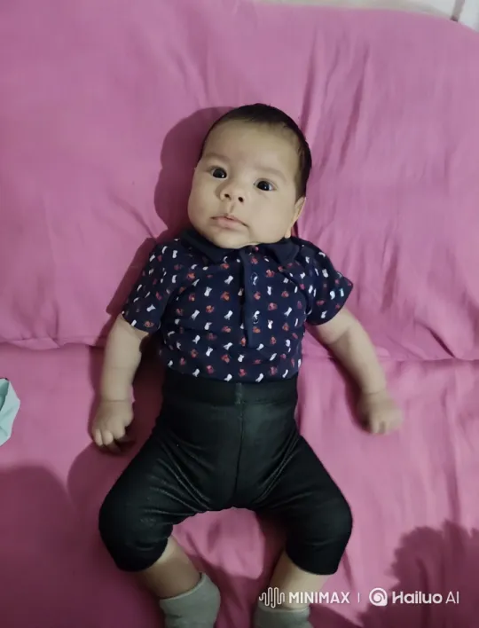 Baby Mimics Kung Fu on Pink Bed – AI Generated Video | Hailuo AI