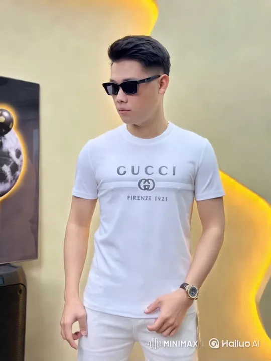 Stylish Man Showcases Gucci T-Shirt in Modern Setting – AI Generated Video | Hailuo AI