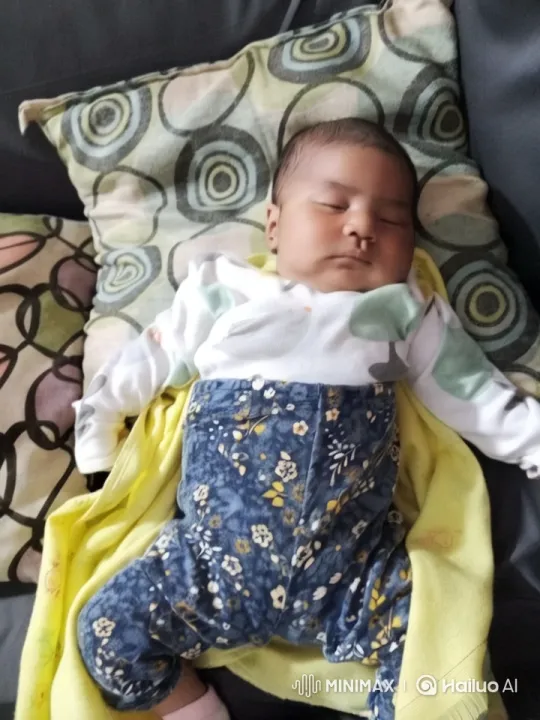 Baby in Cozy Setting with Soft Lighting – AI Generated Video | Hailuo AI