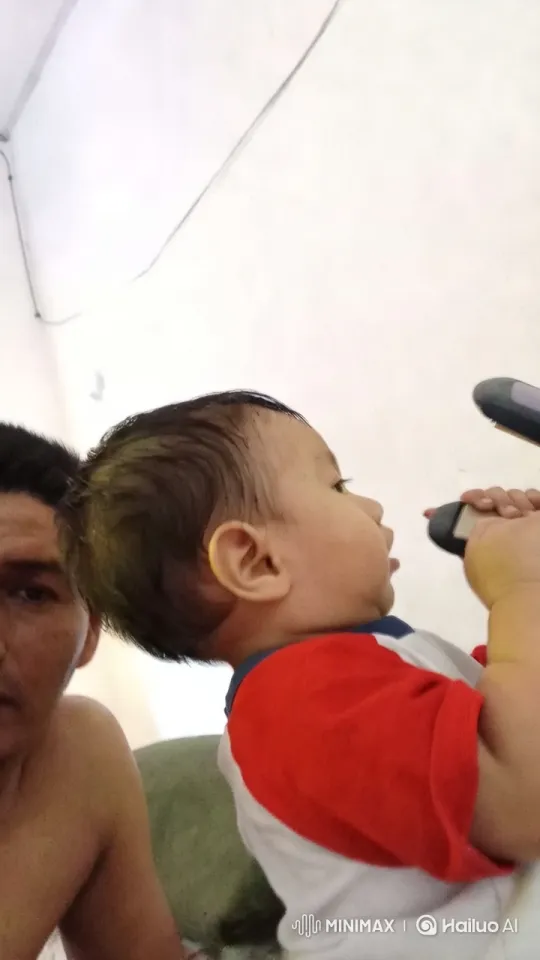 Child Dancing with Remote, Captivating Interaction – AI Generated Video | Hailuo AI