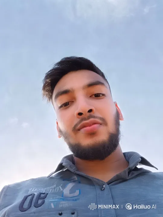 Man in Graphic Shirt Amidst Sky: Aesthetic Camera Moves – AI Generated Video | Hailuo AI