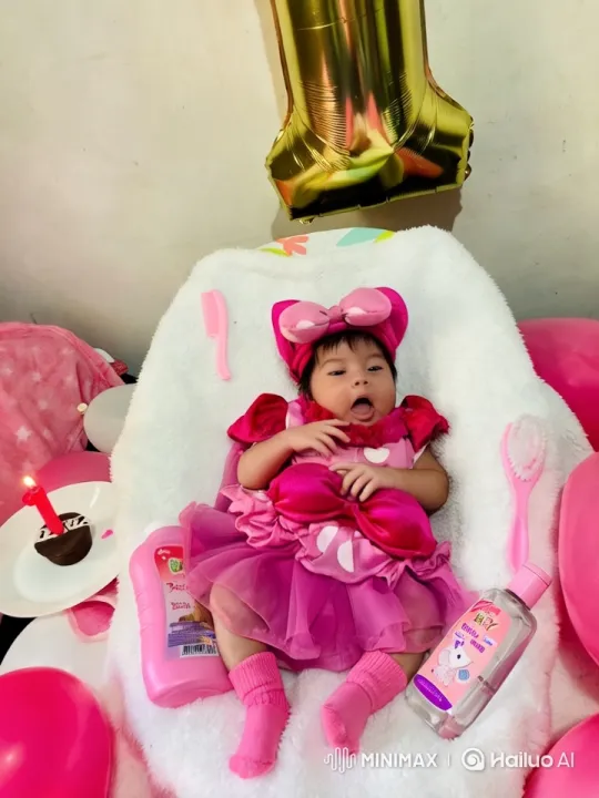 Baby's Joyful Dance in Festive Pink Setting – AI Generated Video | Hailuo AI