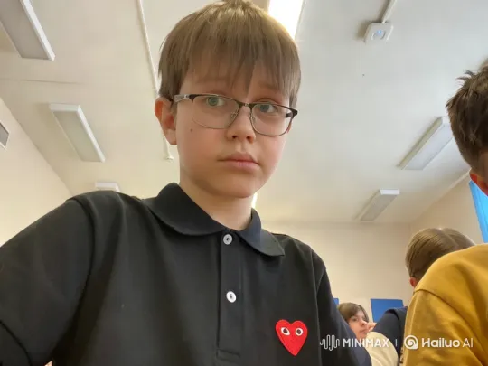 Young Boy Shoots Toy in Bright Classroom – AI Generated Video | Hailuo AI