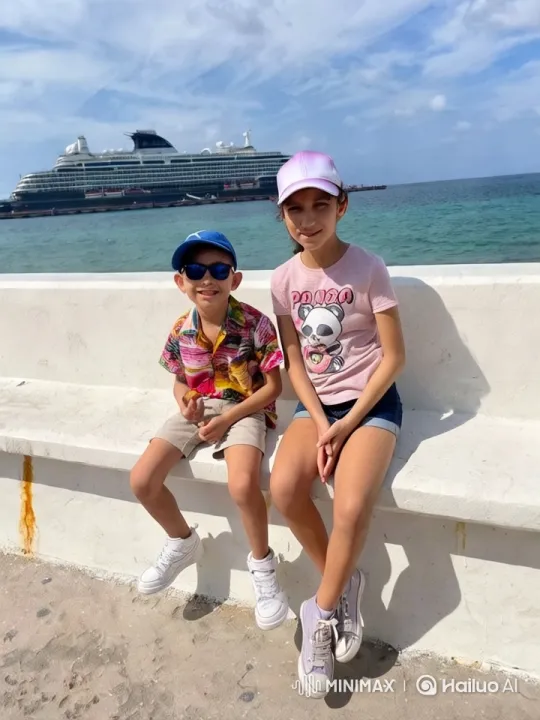 Children Dance Joyfully on Seaside Bench – AI Generated Video | Hailuo AI