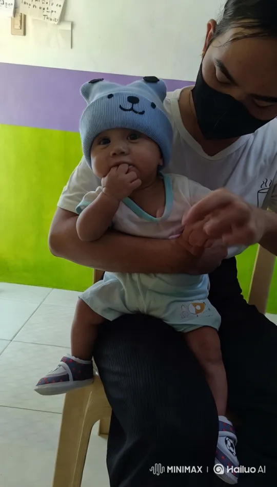 Vibrant Playful Interaction with Child on Lap – AI Generated Video | Hailuo AI