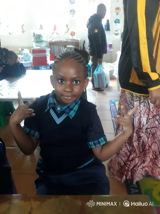 Child in Classroom Performs Hand Gestures – AI Generated Video | Hailuo AI