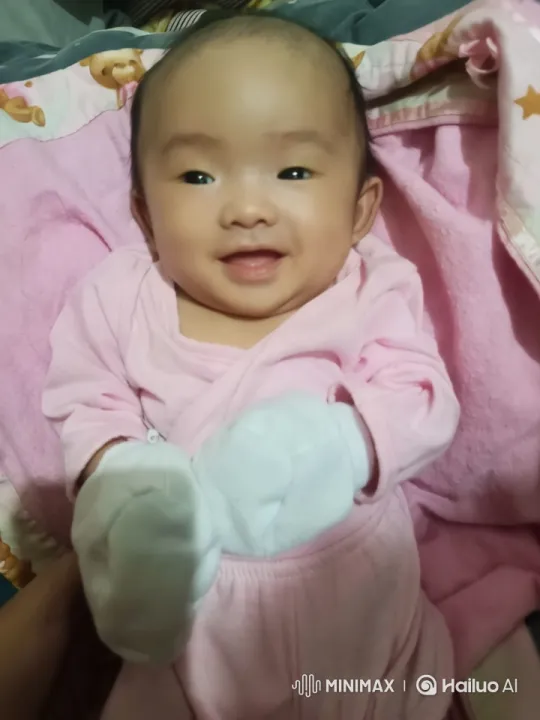Baby's Playful Kungfu Dance on Pink Blanket – AI Generated Video | Hailuo AI