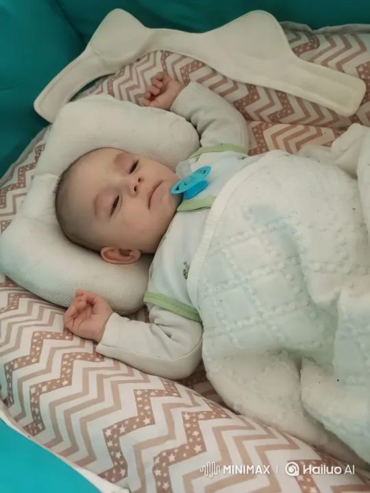 Baby's Joyful Wake-Up and Playtime in Crib – AI Generated Video | Hailuo AI