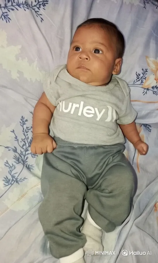 Baby on Floral Bed with Gentle Movements – AI Generated Video | Hailuo AI