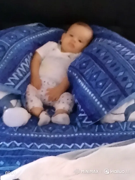 Baby Dancing Enthusiastically on Colorful Blanket – AI Generated Video | Hailuo AI