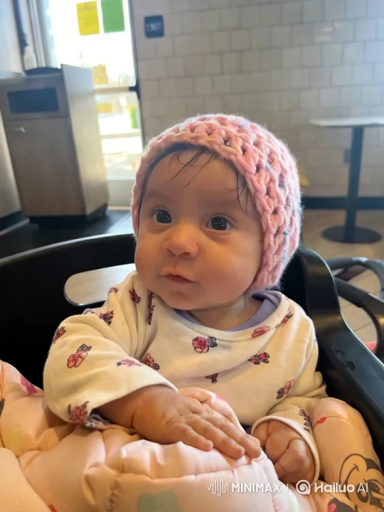 Baby Dances and Mimics Kungfu in Cozy Café Setting – AI Generated Video | Hailuo AI