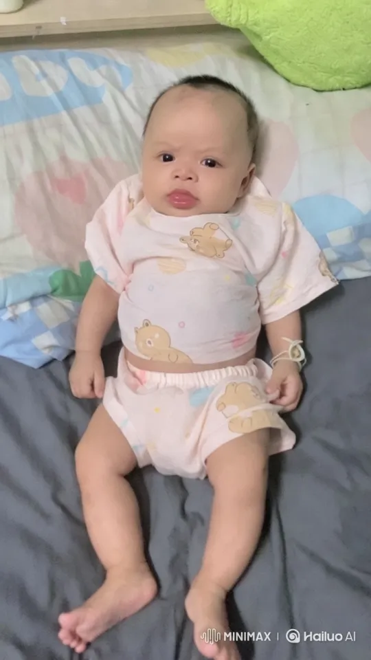Baby Dancing Playfully on Bed with Toy Background – AI Generated Video | Hailuo AI