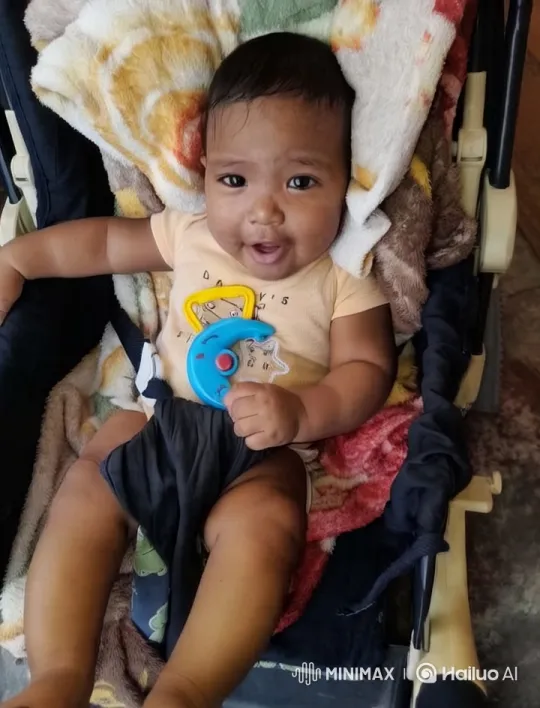 Baby Dancing in Stroller with Toy – AI Generated Video | Hailuo AI