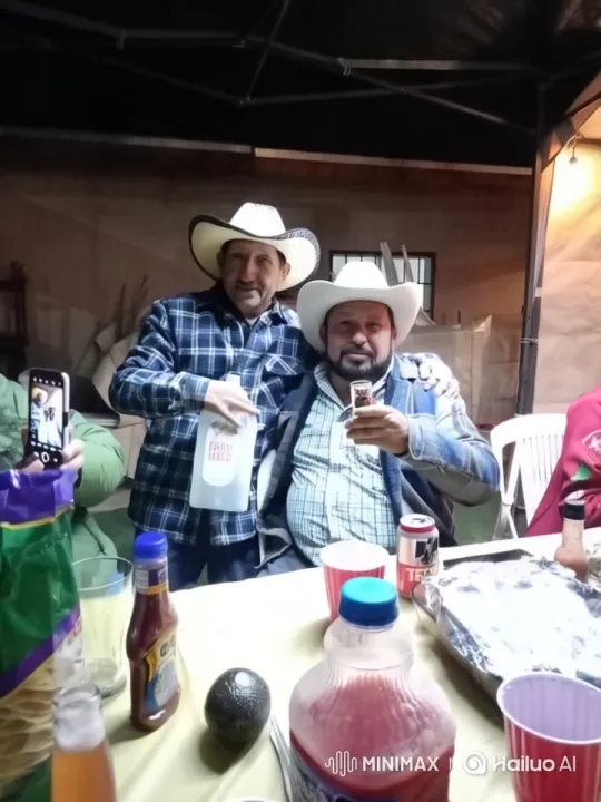 Cowboys Share Affectionate Moment at Outdoor Gathering – AI Generated Video | Hailuo AI