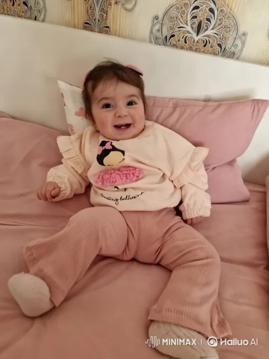 Baby's Joyful Dance in a Cozy Pink Bedroom – AI Generated Video | Hailuo AI