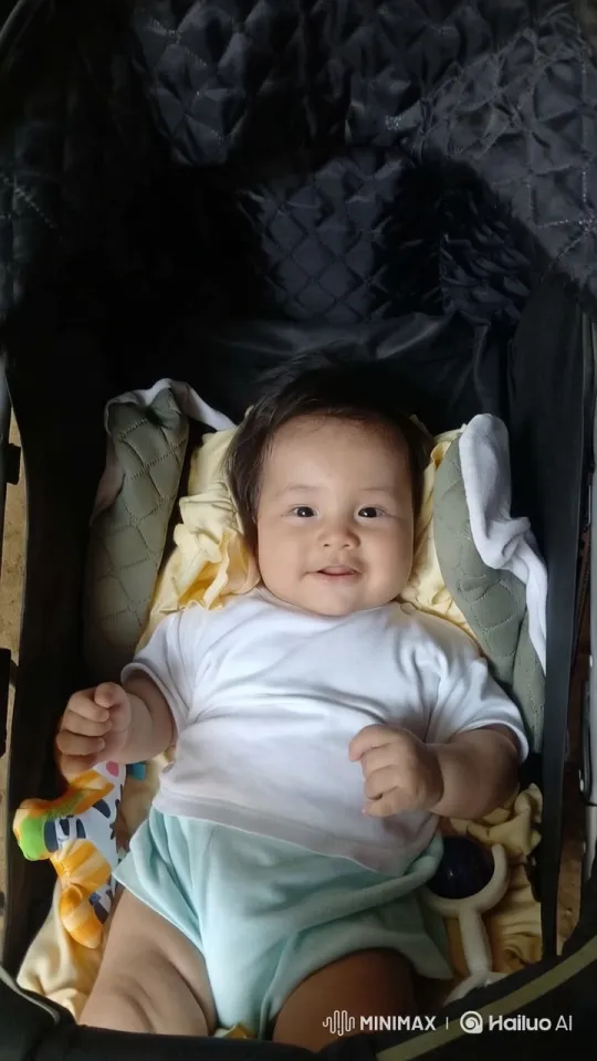 Baby's Playful Dance in Cozy Stroller Setting – AI Generated Video | Hailuo AI