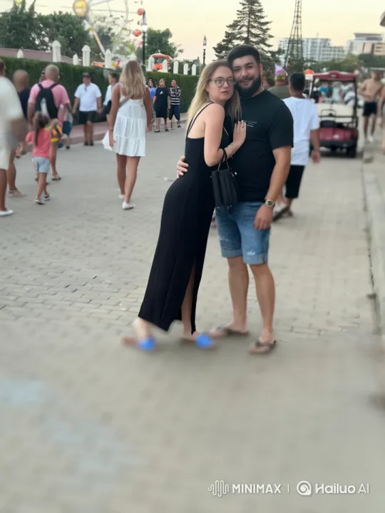 Couple Engages in Kungfu Battle Amidst Bustling Outdoor Scene – AI Generated Video | Hailuo AI