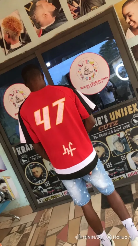 Young Man Showcases Martial Arts Outside Barbershop – AI Generated Video | Hailuo AI