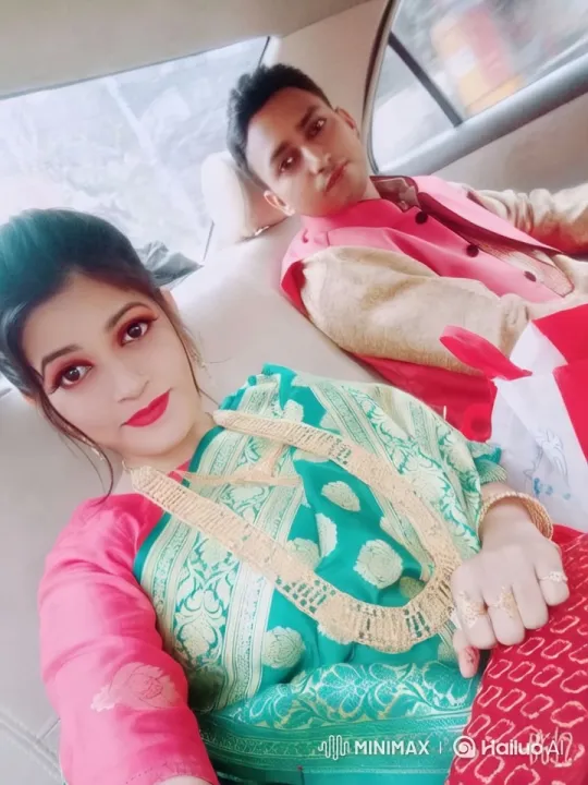 Couple in Traditional Attire Shares Tender Moment in Car – AI Generated Video | Hailuo AI