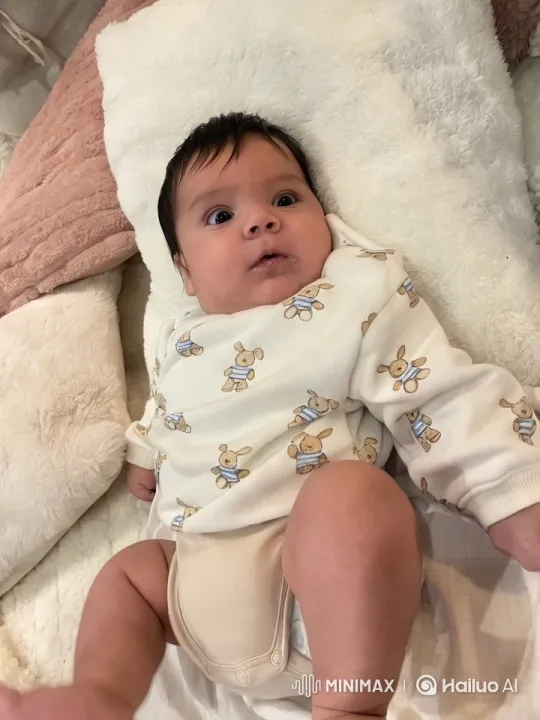 Baby Dancing in Cozy Onesie on Soft Blanket – AI Generated Video | Hailuo AI