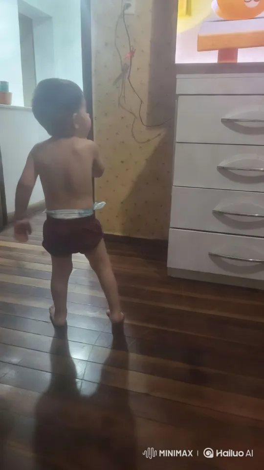 Toddler Watches Animated Show in Cozy Room – AI Generated Video | Hailuo AI