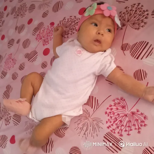 Baby's Joyful Dance on a Colorful Blanket – AI Generated Video | Hailuo AI
